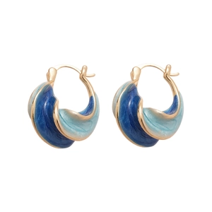 Elegant twisted gold earrings with gradient blue enamel and a minimalist wave design