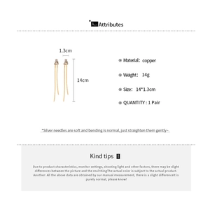 Détails des boucles d'oreilles à longs glands dorés en cuivre avec tiges en argent