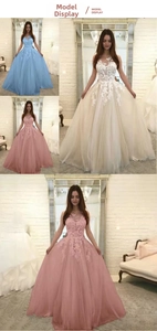 Detailed embroidery and multi-layer mesh tulle on three colors of evening gowns