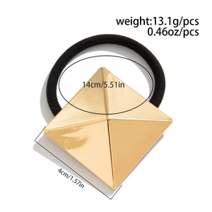 Detail view of black ponytail holder with golden pyramid showing weight and size specs