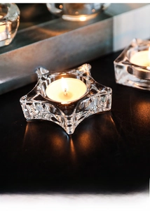 Star-shaped glass candle holder with tea light for romantic home decor and table setting