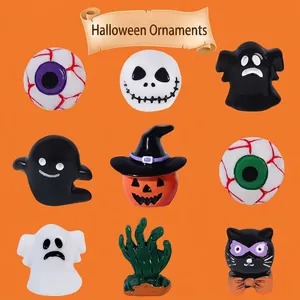 Set of 9 Halloween resin figurines including ghosts, pumpkins, skulls, and black cat decorations