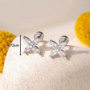 Silver flower stud earrings with marquise cubic zirconia and screw back on display