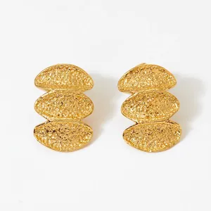 Minimalist 316L stainless steel gold earrings with a hammered triple oval layered design