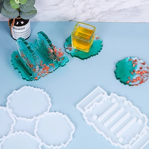 Detailed view of DIY resin silicone coaster mold set with gold foil epoxy finished samples