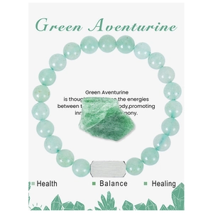 Detail of green aventurine beaded bracelet with raw healing stone on display card