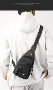 Detail view of water-resistant oxford chest bag with SPORT earphone port and front pocket