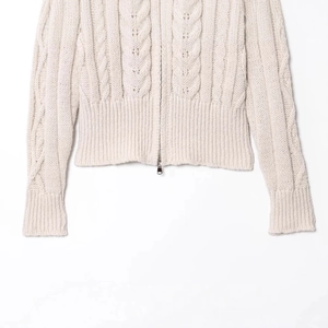 Cream knit cardigan with zip-up collar and cable knit texture for a casual style