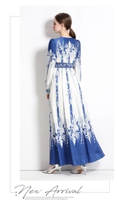 Detailed back view of a silky floral maxi dress featuring elegant blue and white patterns