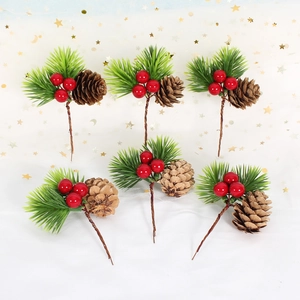 Close-up of 6 artificial pine needle stems with natural pine cones and red berries decorations