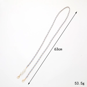 Blue woven leather crossbody chain with golden links and white pearl charms, 63cm long