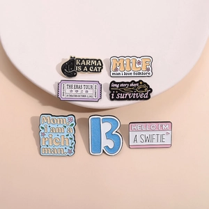 Set of 7 colorful enamel pins featuring THE ERAS TOUR and Taylor Swift fan lyrics