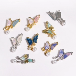 Detailed set of butterfly pendants with colorful resin wings and imitation pearls