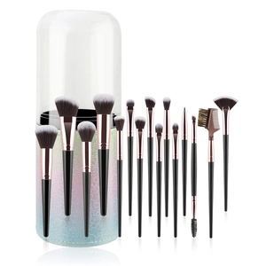 Detailed set of 14 professional makeup brushes with a gradient sequin storage cylinder