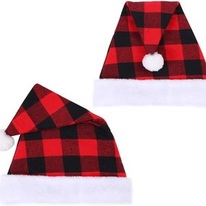 Classic red and black buffalo plaid Christmas hats with white plush trim on white background