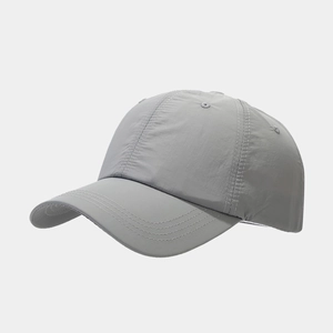 Side view of light grey quick-dry baseball cap with reinforced brim and breathable eyelets