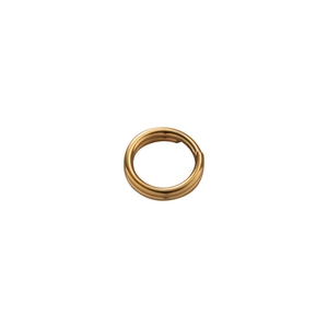 Macro shot of a golden double-loop jump ring for DIY jewelry and keychain connections