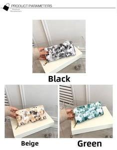 Detailed macro view showing marble floral print long wallets in black, beige and green