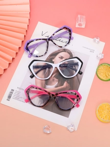 Detailed view of cat-eye eyewear frames with size specs and floral pattern styles
