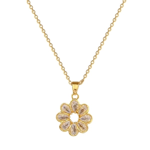 Luxurious gold titanium necklace featuring a crystal floral pendant on a white background