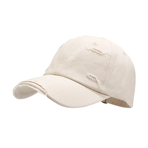 Vintage beige washed cotton baseball cap with distressed rip details and curved brim
