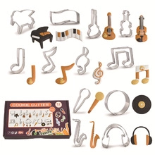 Detailed 12-piece music theme cookie cutter set with guitar, piano and music note shapes
