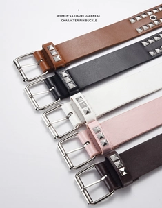 Parallel view of multicolored PU leather belts with three rows of square metal studs