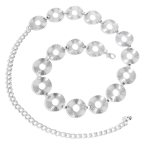 Detail of silver punk waist chain with sunburst textured circular metal plates and lobster clasp