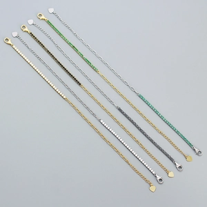 Detail of s925 silver chain bracelets with colorful zircon and heart charm pendants