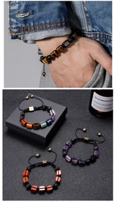 Detail of adjustable woven natural stone bracelets with tiger eye and colorful beads