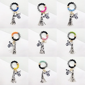 Western style cow print wooden bead keychain bracelet with tassel and mama cow pendant