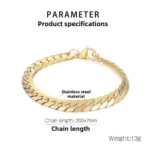 Detail view of a 7mm wide gold-toned stainless steel Cuban link bracelet with lobster clasp