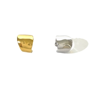 Minimalist horseshoe U-shaped ear cuffs in gold and silver finish on white background