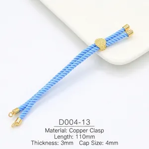 Detailed view of 3mm blue braided cord bracelet with gold copper adjustable leaf slider