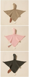 Detailed flat lay of soft cotton muslin baby comforters in beige pink and dark grey colors