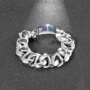Detailed top view of a heavy silver stainless steel Cuban link chain bracelet for men