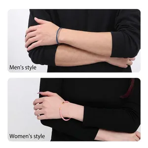 Bracciali di coppia in acciaio al titanio intrecciato blu navy e rosa con tocchi dorati