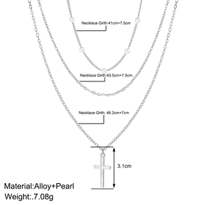 Three-layer silver necklace set with pearl accents and a cross pendant with dimensions