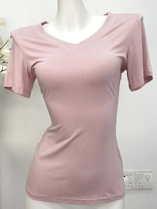 Pink V-neck short sleeve T-shirt for women in a loose fit made of soft knit fabric