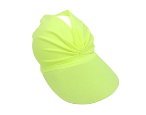 Detail of neon green summer sun hat showing the pleated elastic fabric texture and visor