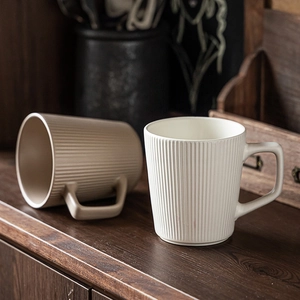 Japanese retro style ceramic mugs set with vertical stripes in beige and brown colors