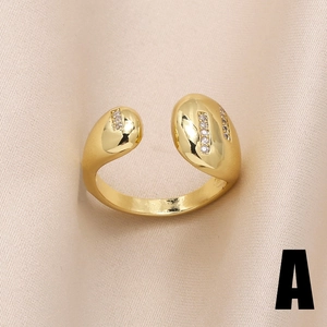 Elegant gold-plated open heart ring with sparkling zircon inlays on a satin background