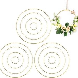 Golden metal dream catcher rings in a nested set for DIY floral wreath decoration