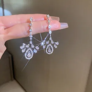 Elegant silver-tone water drop tassel earrings with shimmering zircon crystals for women
