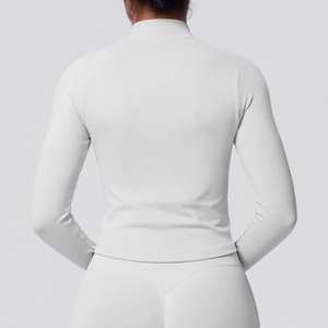 Detail of grey athletic set with ribbed back pattern for compression and breathability