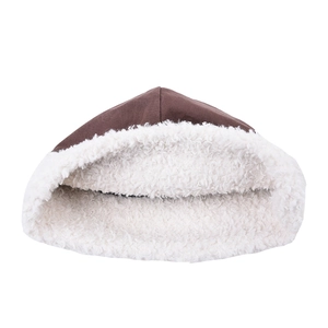 Brown winter bucket hat with thick white faux lamb wool lining on plain white background