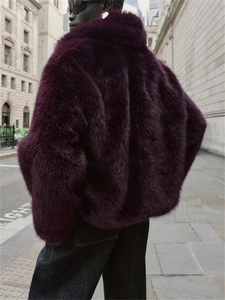 Oversized deep purple faux fur jacket for women in street style city street view