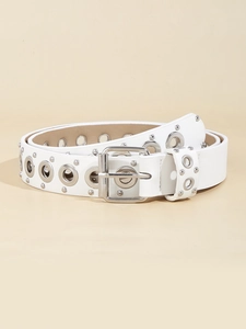 Macro shot of white punk leather belt with silver metal grommets and rivets detailing