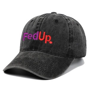 Macro view of vintage washed baseball cap with FedUp embroidery and distressed texture
