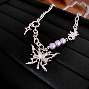 Lava butterfly necklace with purple pearls and star charms in silver stainless steel